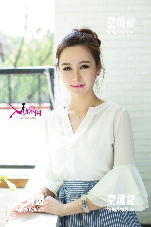 UGirls尤果网 - “短裙”大作战——张美荧的私房图包像在邀我一起跳舞。
